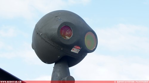 The Mast Mounted Sight (MMS), which resembles a beach ball perched above the rotor system.